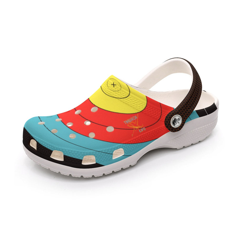 Single TLAA Target Clog at a three-quarter angle with the heel strap flipped back, showing the target rings across the vamp