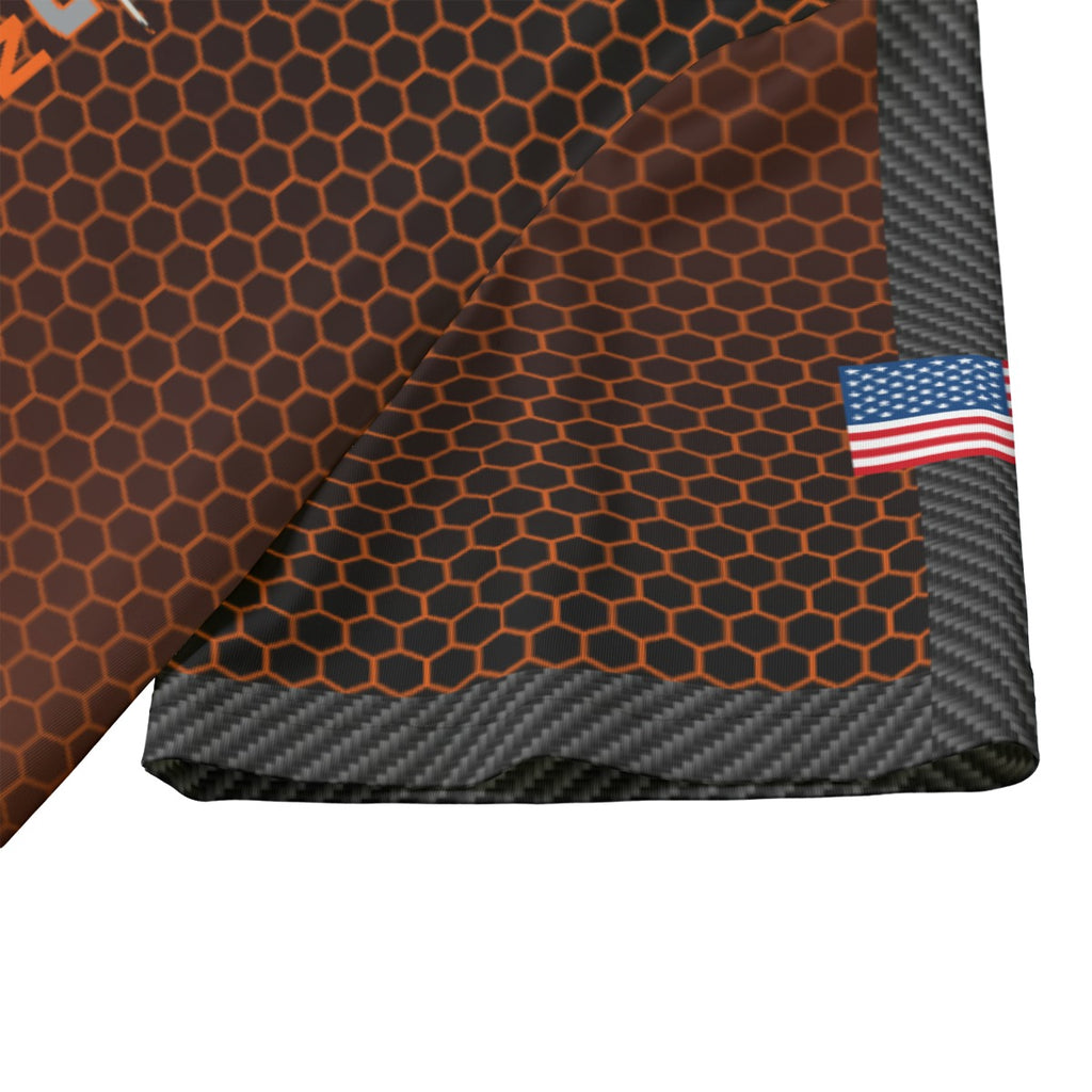 Thwack Life Archery Addiction Shooter Jersey in brown hex, close-up of the sleeve with the US flag and carbon-pattern trim