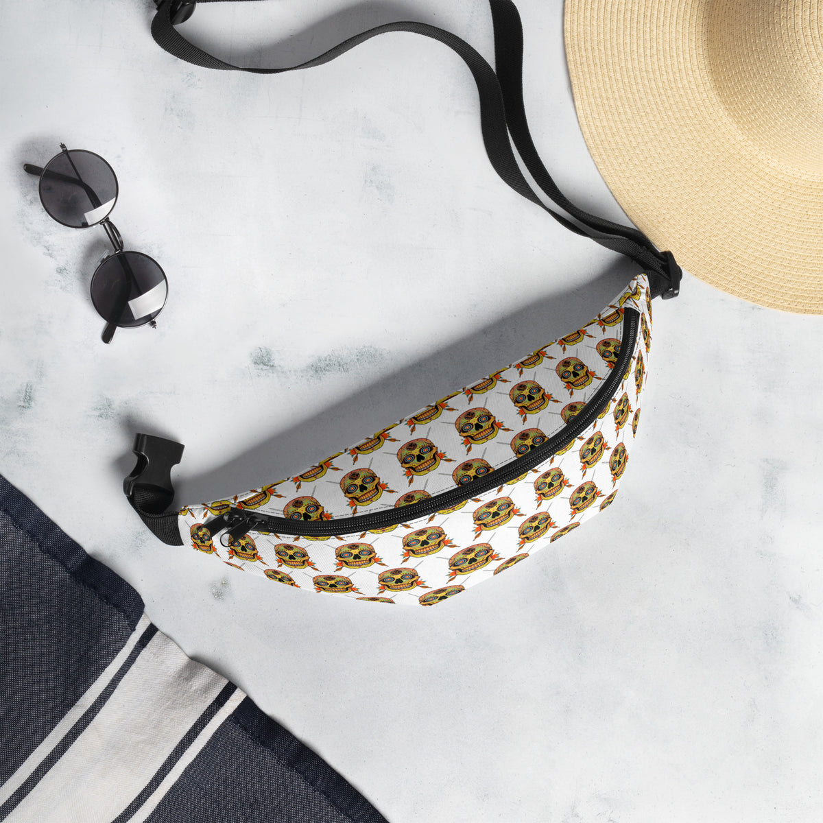 Sugar Skull Cross-Body Bag, flat lay with sunglasses and a straw hat