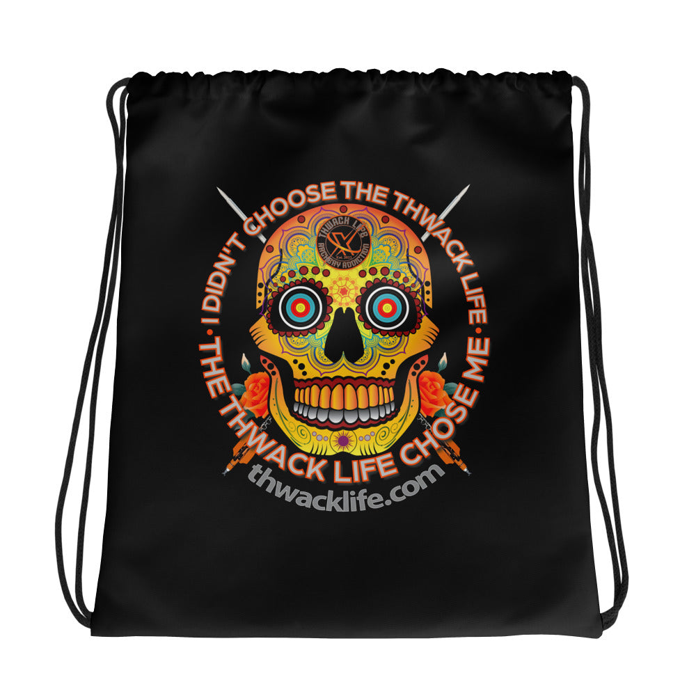 Sugar Skull Drawstring Bag, flat front view, black with the Sugar Skull inside the "I didn't choose the Thwack Life, the Thwack Life chose me" ring