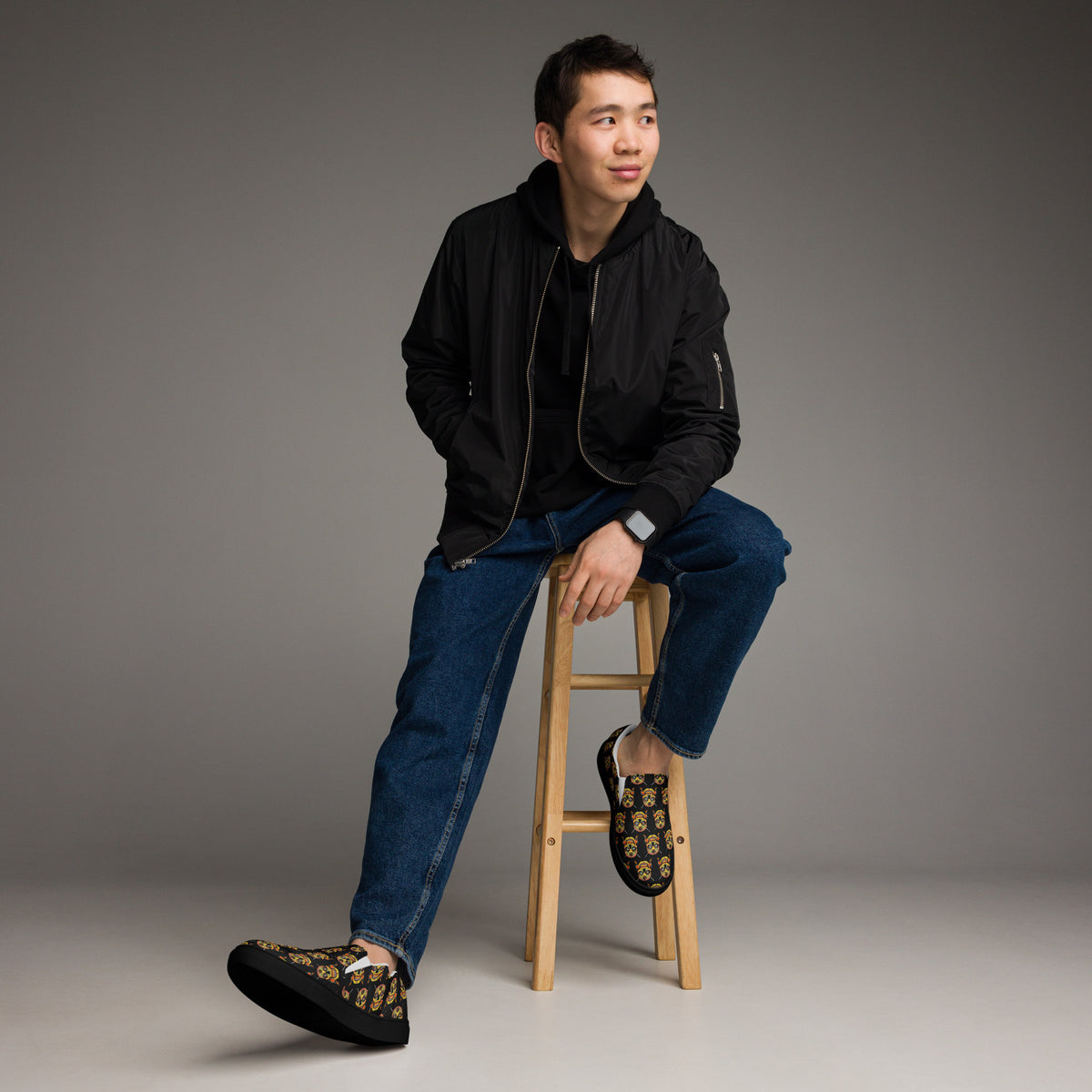 Sugar Skull Kick-Around Shoes, worn by a model seated on a stool
