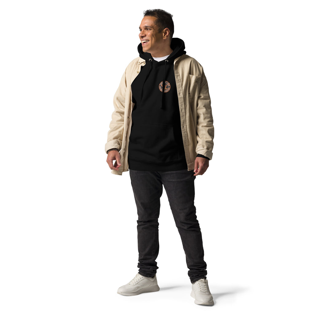 Sugar Skull Pullover Hoodie in Black, worn under a tan jacket, full-length front view