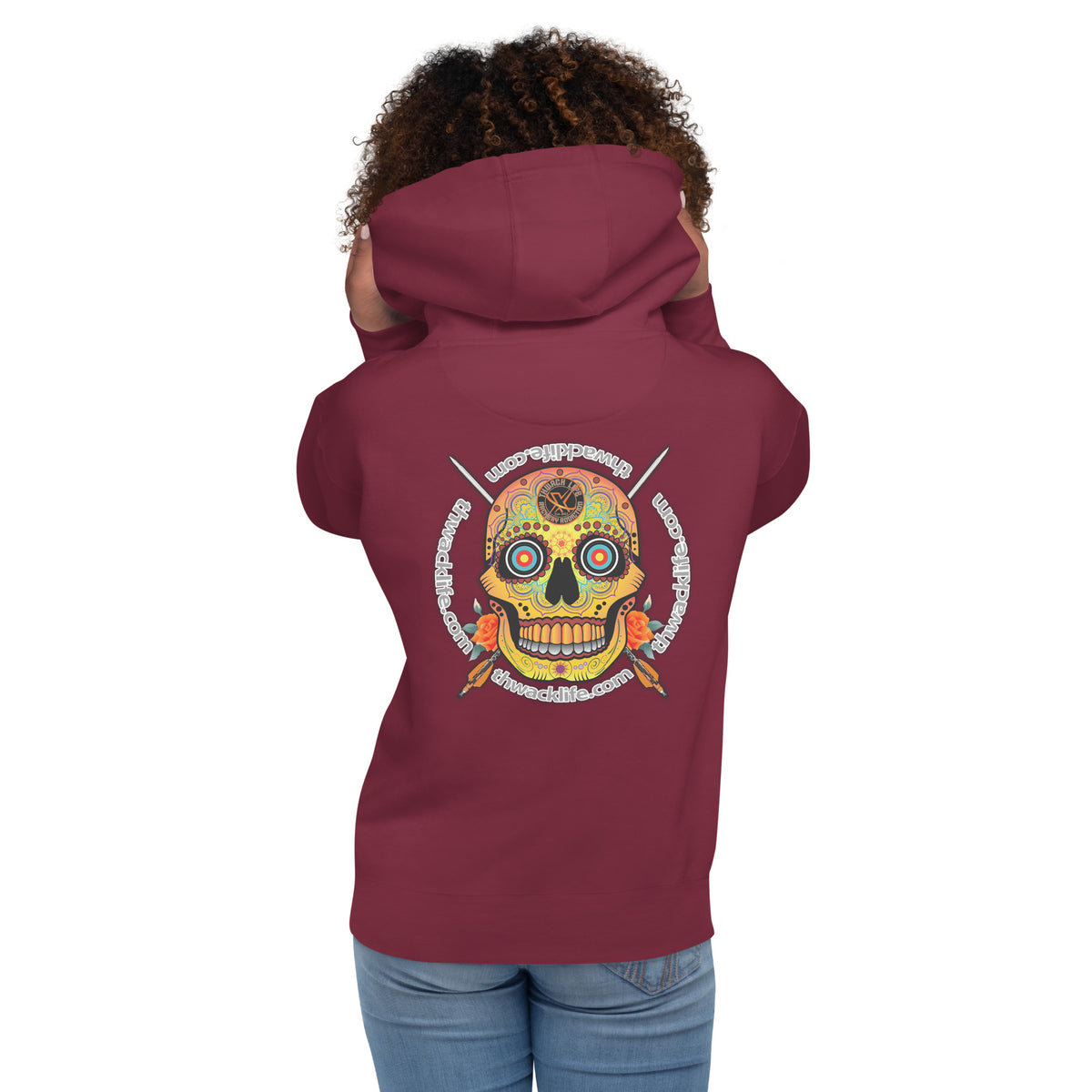 Sugar Skull Pullover Hoodie in Maroon, back view on a model showing the Sugar Skull with the thwacklife.com ring
