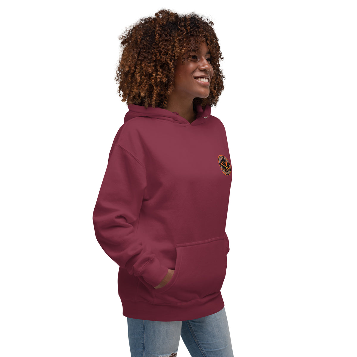 Sugar Skull Pullover Hoodie in Maroon, three-quarter front view on a model with the small round chest logo