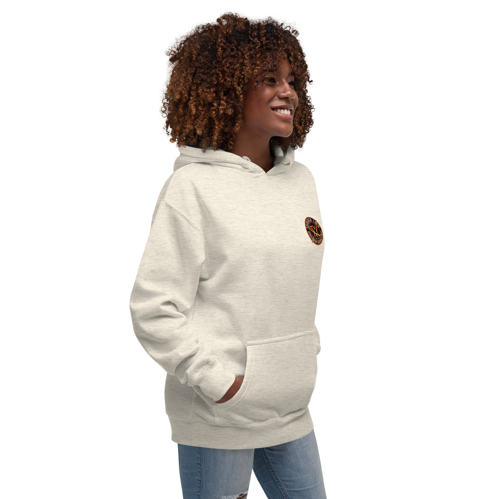 Sugar Skull Pullover Hoodie in Oatmeal Heather, three-quarter front view on a model with the small round chest logo