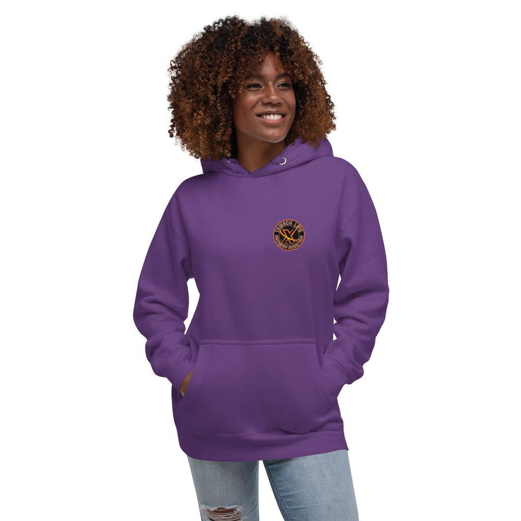 Sugar Skull Pullover Hoodie in Purple, front view on a model with the small round chest logo