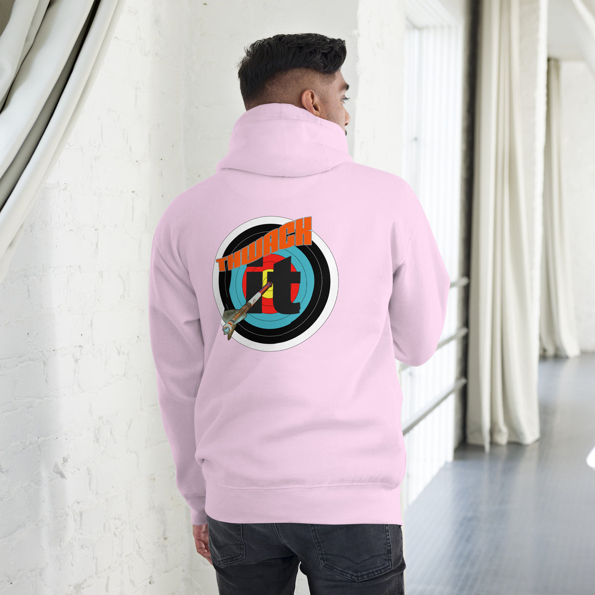 Thwack It Pullover Hoodie in Lavender, back view on a model showing the THWACK it target-and-arrow design