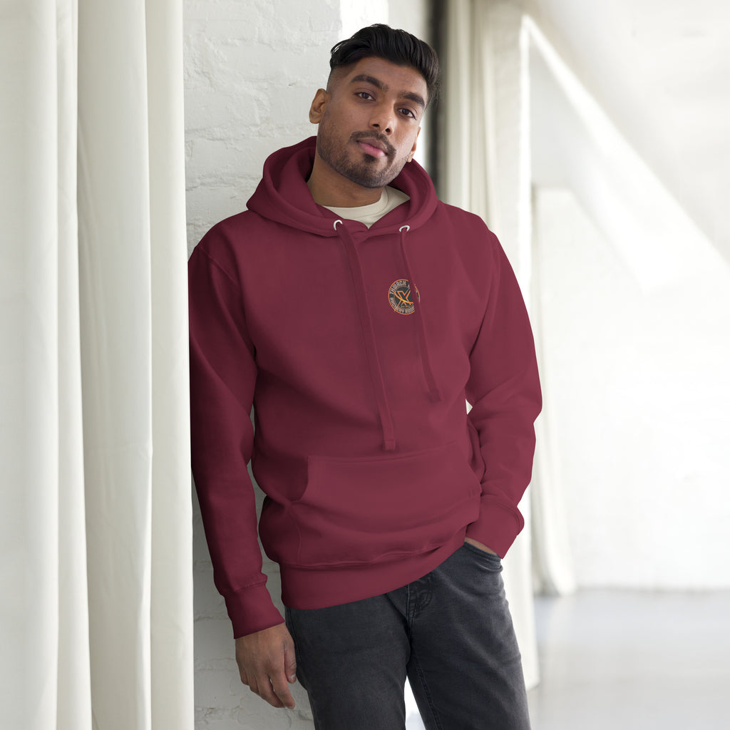 Thwack It Pullover Hoodie in Maroon, front view on a model with the small round chest logo