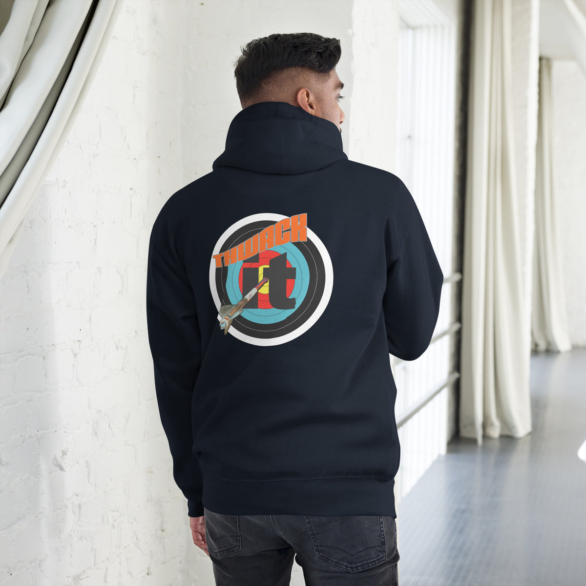 Thwack It Pullover Hoodie in Navy Blazer, back view on a model showing the THWACK it target-and-arrow design