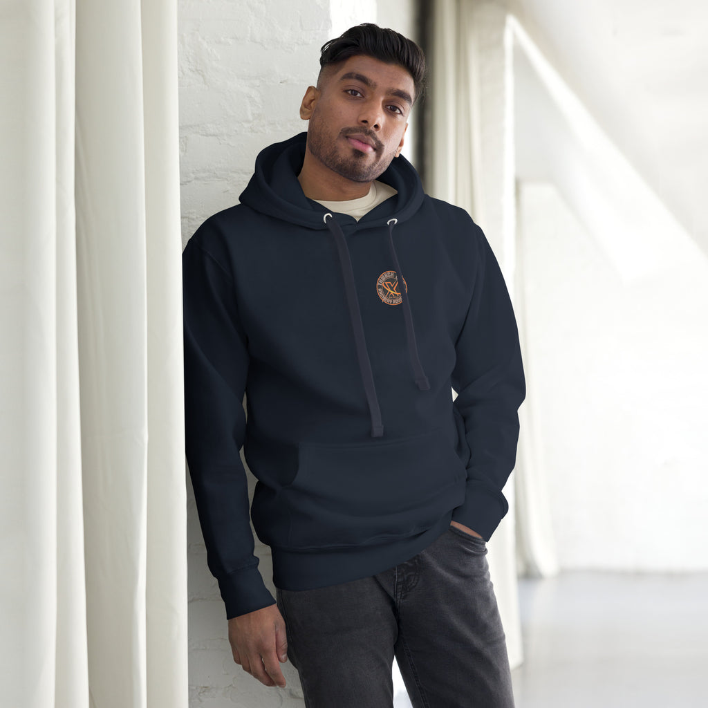 Thwack It Pullover Hoodie in Navy Blazer, front view on a model with the small round chest logo
