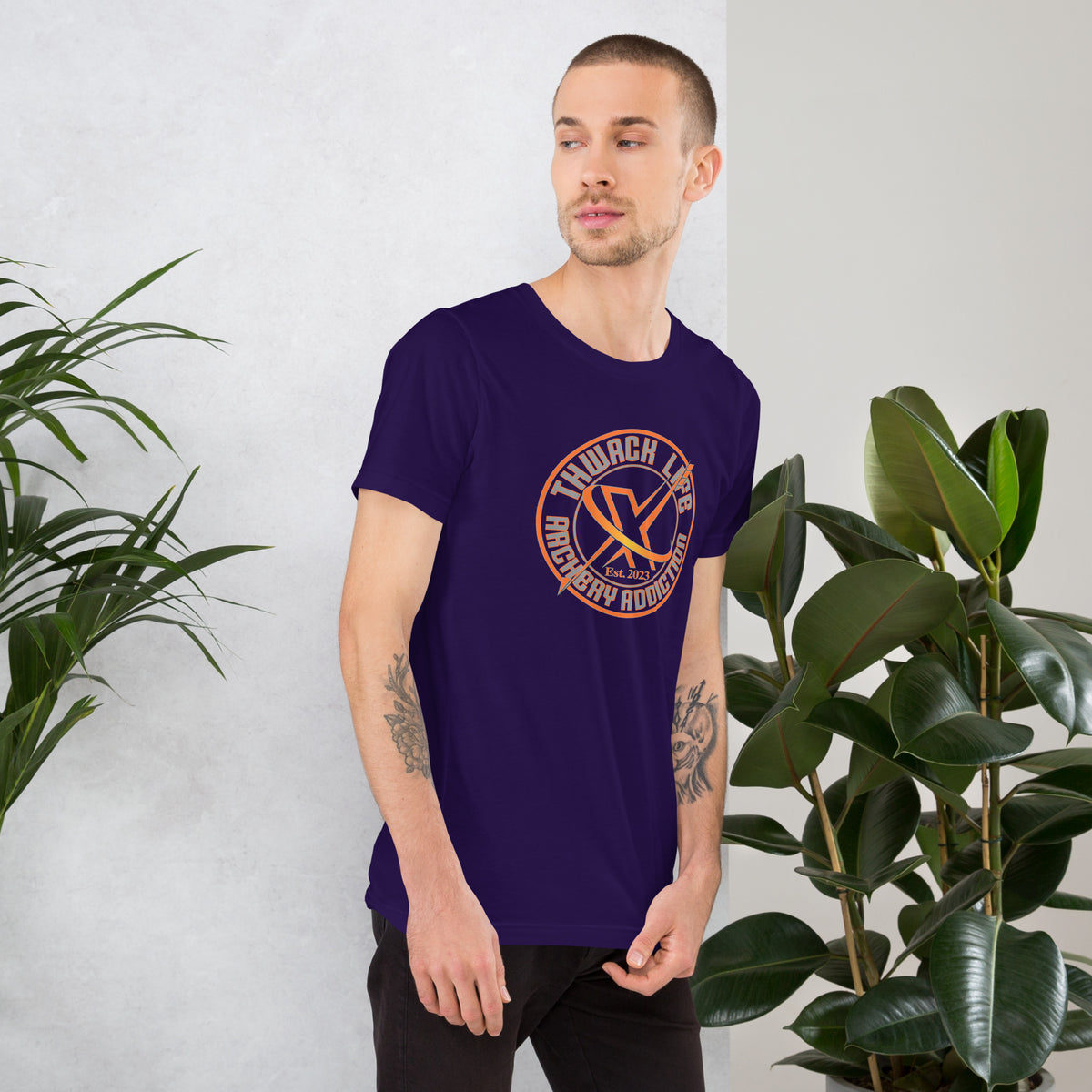 Wordmark T-Shirt in Team Purple, worn by a model indoors